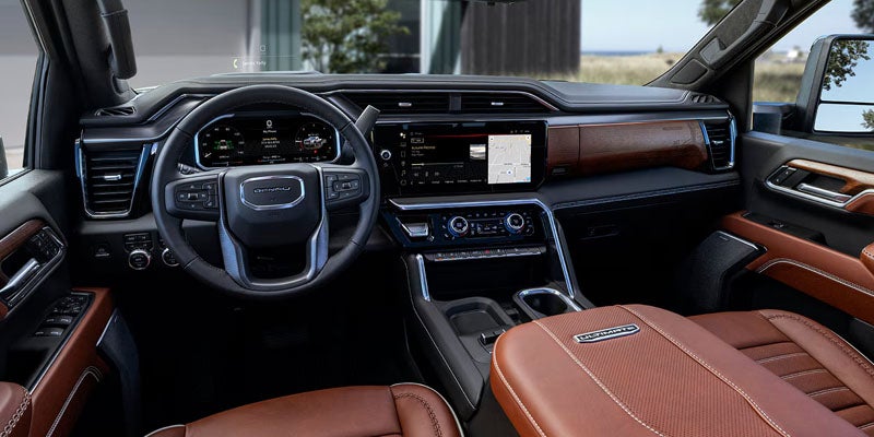 Modern Mitch Hall GMC interior featuring a digital driver display